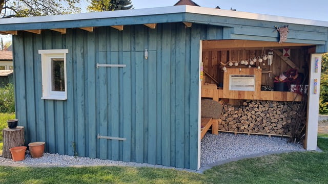 blauw tuinhuisje biologische houtverf