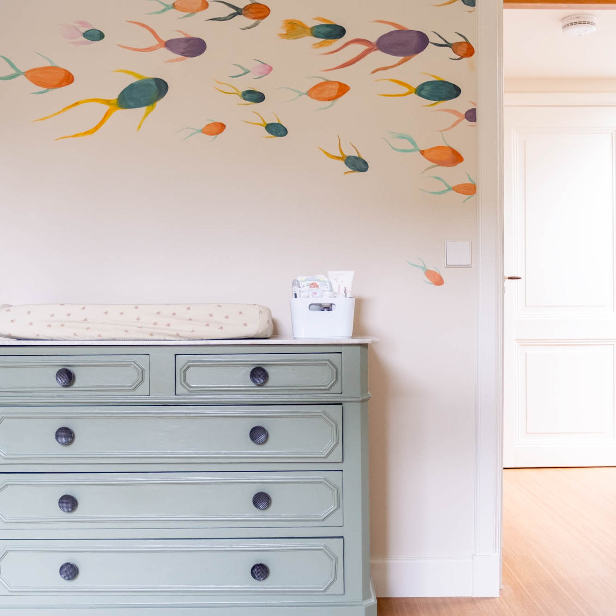 vissen muurschildering babykamer